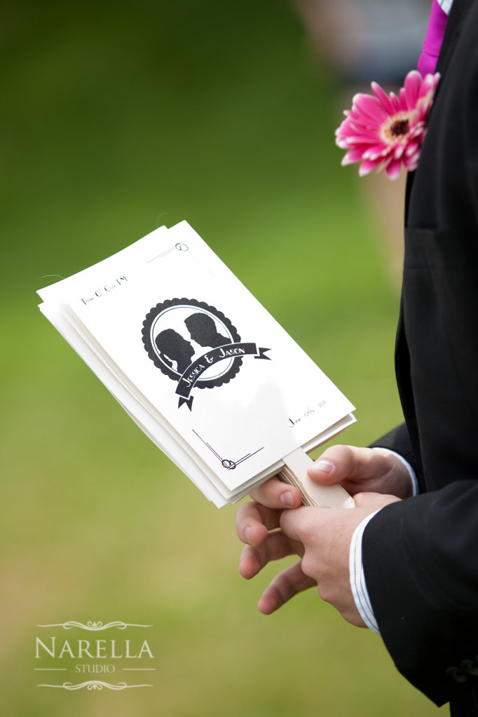 Keep your guests cool with a wedding program that doubles as a fan